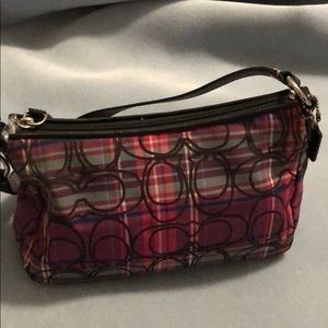 A small Coach purse